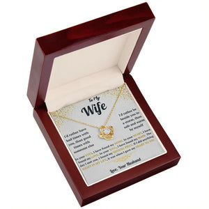 Gold necklace with heart pendant in a wooden box with a sentimental message card.